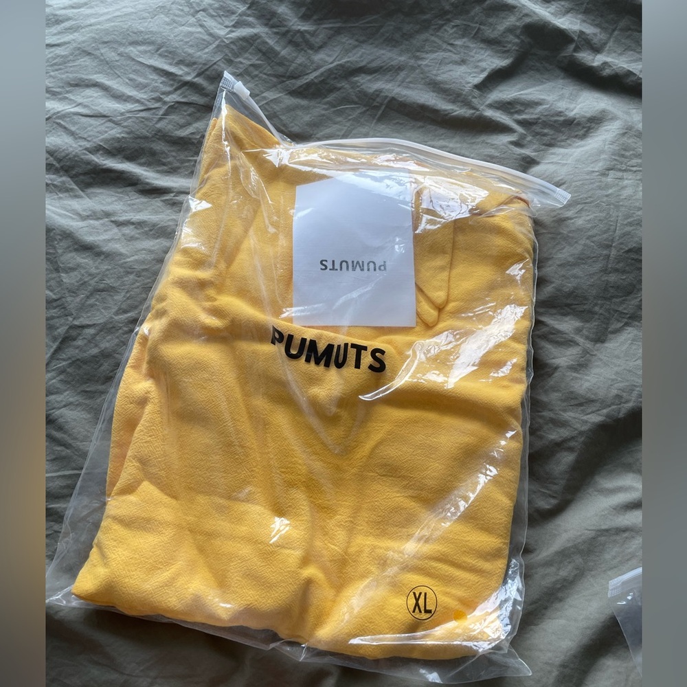 Yellow Pumutas bralette top and high-waisted matching flowy pants